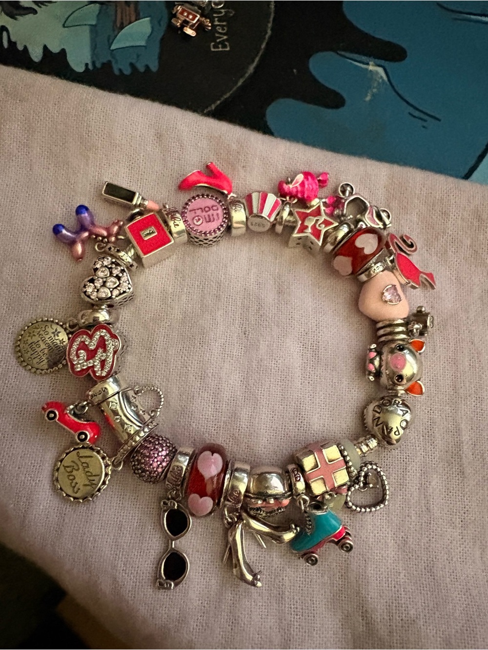 Pandora bracelet with Barbie theme